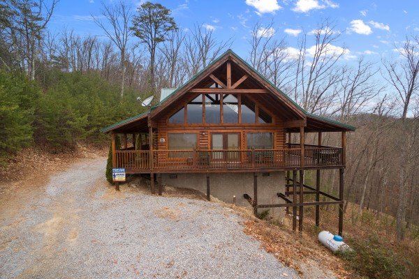Cabin and parking at Bootlegger's Bounty, a 1-bedroom cabin rental located in Pigeon Forge