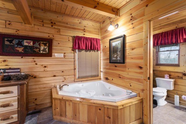 In room jacuzzi at Bootlegger's Bounty, a 1-bedroom cabin rental located in Pigeon Forge