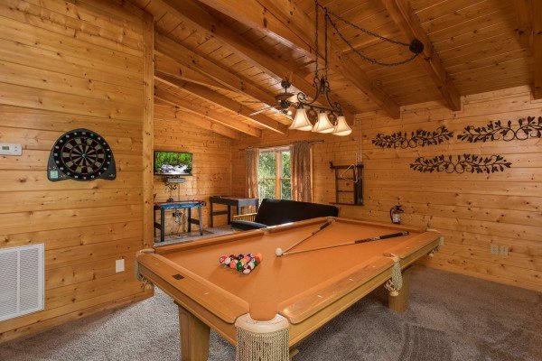 Pool table at Laid Back, a 2 bedroom cabin rental located in Pigeon Forge