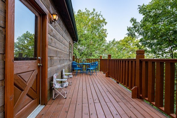 Deck seating at Tip Top View, a 3 bedroom cabin rental located in Pigeon Forge