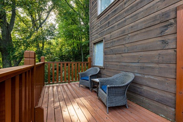 Deck table and two chairs at Tip Top View, a 3 bedroom cabin rental located in Pigeon Forge