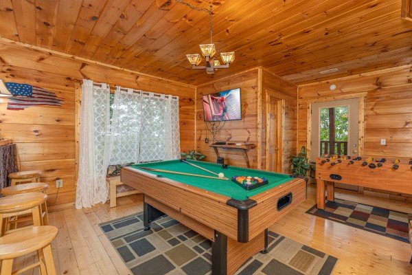 Pool table game loft at Tip Top View, a 3 bedroom cabin rental located in Pigeon Forge