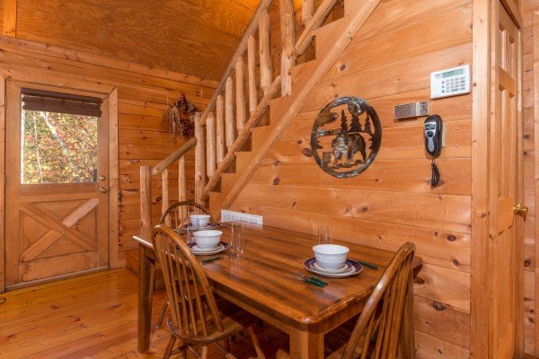 Dining table for three at Lincoln Logs, a 2 bedroom cabin rental located in Gatlinburg