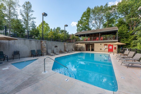 Pool for guests at Ain't Misbehaven, a 1 bedroom cabin rental located in Pigeon Forge
