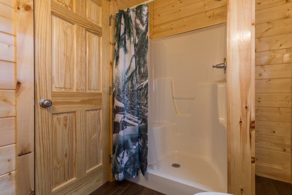 Bathroom with a shower at Splash Mountain Lodge a 4 bedroom cabin rental located in Gatlinburg