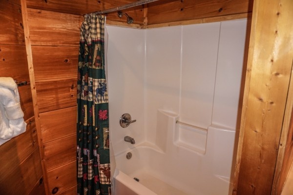 Shower in the bathroom at Deerly Beloved, a 1-bedroom cabin rental located in Gatlinburg