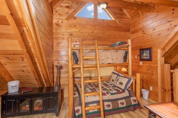 Bunk bed in the game loft at Bearfoot Memories, a 2-bedroom cabin rental located in Pigeon Forge