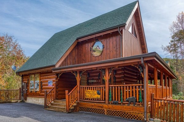 Exterior of the cabin from the flat parking at Bearfoot Memories, a 2-bedroom cabin rental located in Pigeon Forge