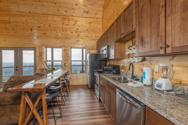 Kitchen with stainless appliances and granite counters at 4 States View, a 2 bedroom cabin rental located in Pigeon Forge
