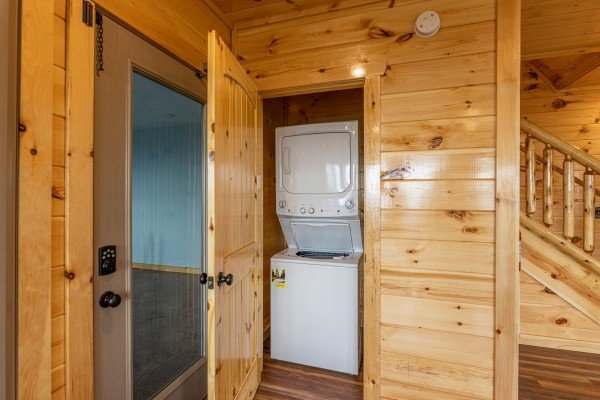 Stacked washer and dryer at 4 States View, a 2 bedroom cabin rental located in Pigeon Forge