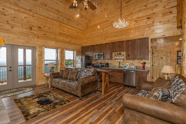 Sofa and loveseat in the living room at 4 States View, a 2 bedroom cabin rental located in Pigeon Forge