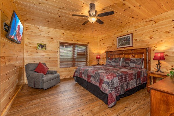 King bedroom at The One With The View, a 4 bedroom cabin rental located in Pigeon Forge