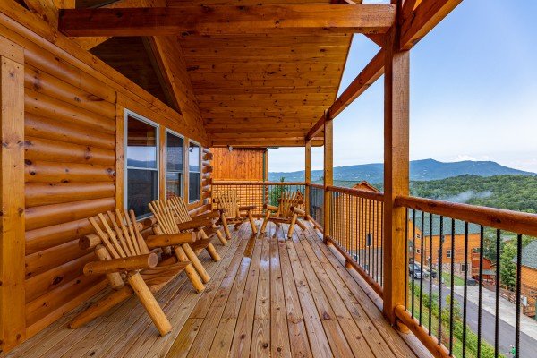 Deck seating and view at The One With The View, a 4 bedroom cabin rental located in Pigeon Forge