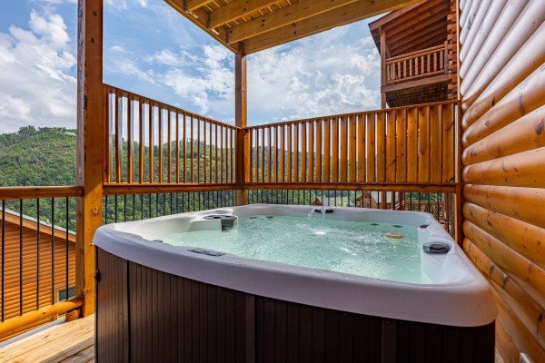 Hot tub at The One With The View, a 4 bedroom cabin rental located in Pigeon Forge