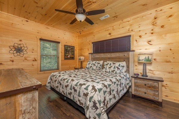 King bedroom with ceiling fan  at Heavenly Daze, a 4 bedroom cabin rental located in Pigeon Forge
