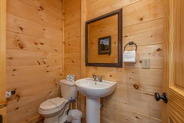 Half bath at Heavenly Daze, a 4 bedroom cabin rental located in Pigeon Forge