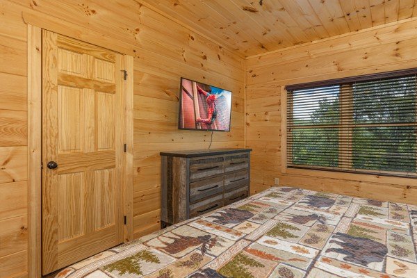 Master king room TV at Heavenly Daze, a 4 bedroom cabin rental located in Pigeon Forge