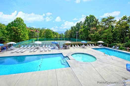 Outdoor pool at Chalet Village for guests at Terrace Garden Manor, a 13 bedroom cabin rental located in Gatlinburg