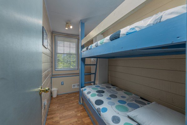 Twin bunk beds at Terrace Garden Manor, a 13 bedroom cabin rental located in Gatlinburg