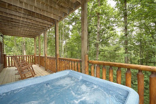 Hot tub on the deck at Country Bear's Getaway, a 3-bedroom cabin rental located in Gatlinburg