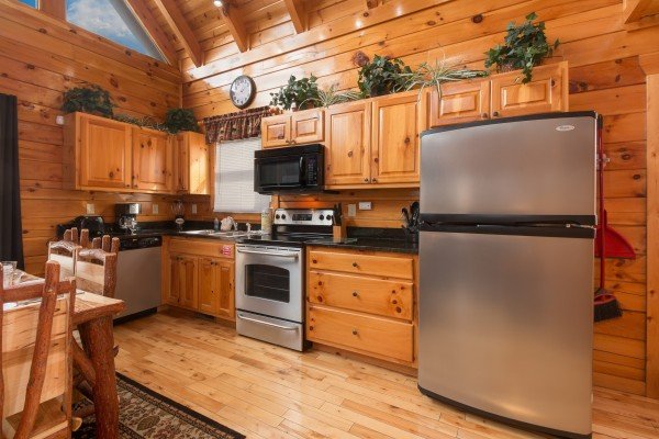 Kitchen with stainless appliances at Country Bear's Getaway, a 3-bedroom cabin rental located in Gatlinburg