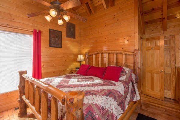 Bedroom with a log bed at Country Bear's Getaway, a 3-bedroom cabin rental located in Gatlinburg
