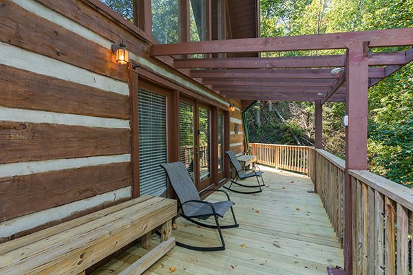 Rocking chairs on the deck at Soaring Heights, a 3 bedroom cabin rental located in Gatlinburg