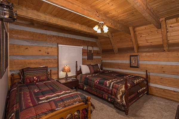 Bedroom with two beds at Soaring Heights, a 3 bedroom cabin rental located in Gatlinburg