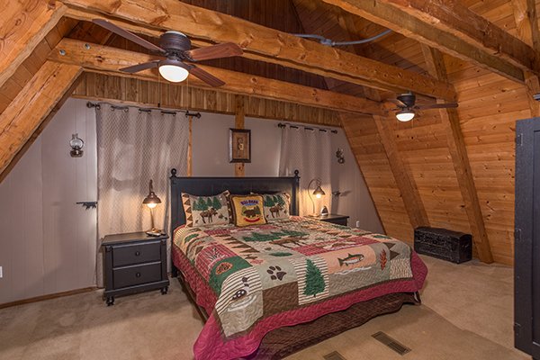 King bed in a loft room at Soaring Heights, a 3 bedroom cabin rental located in Gatlinburg