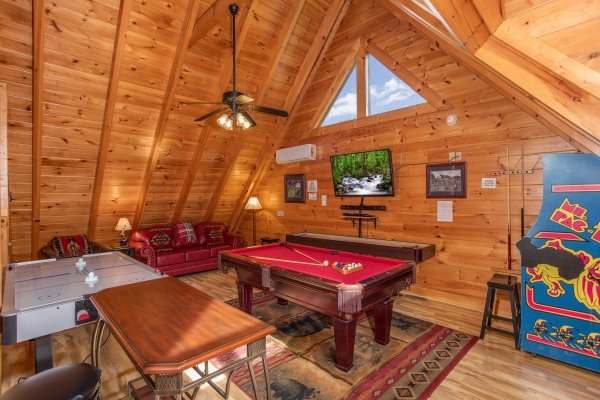 Game loft at Bearfoot Memories, a 2-bedroom cabin rental located in Pigeon Forge