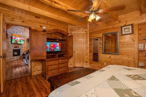 King room with flat screen tv at Bearfoot Memories, a 2-bedroom cabin rental located in Pigeon Forge