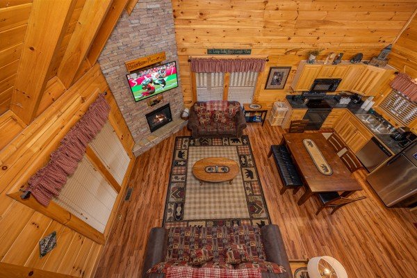 Living room drone view at Bearfoot Memories, a 2-bedroom cabin rental located in Pigeon Forge