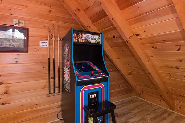 Arcade game at Bearfoot Memories, a 2-bedroom cabin rental located in Pigeon Forge