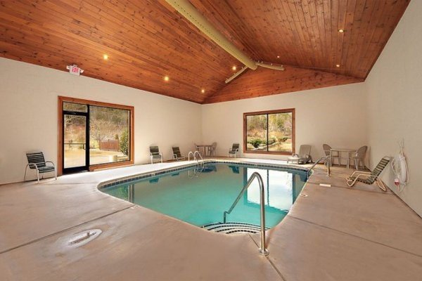 Resort indoor pool at Bearfoot Memories, a 2-bedroom cabin rental located in Pigeon Forge