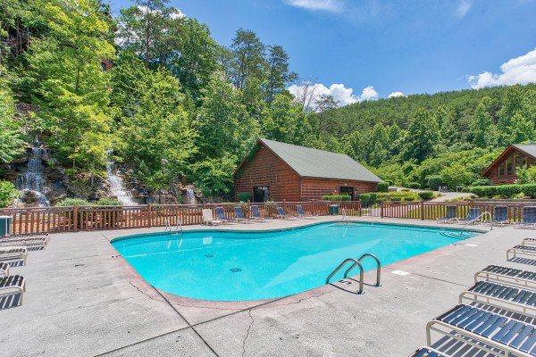 Outdoor pool at Bearfoot Memories, a 2-bedroom cabin rental located in Pigeon Forge