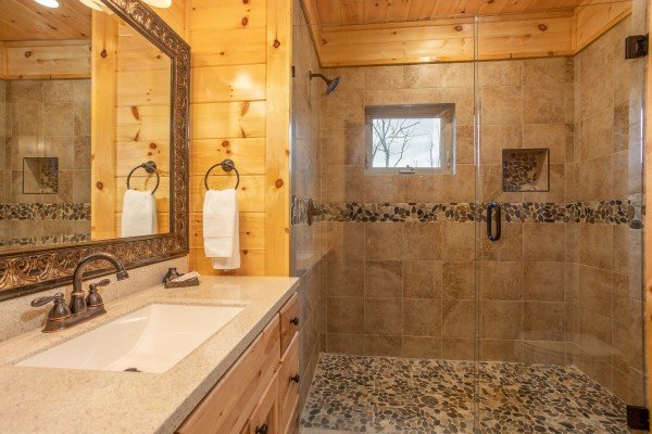 Glassed shower at Happy Bear's Hideaway, a 2 bedroom cabin rental located in Gatlinburg