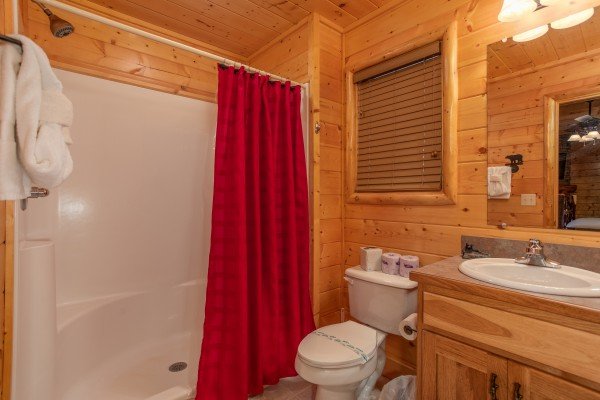 Bathroom with a walk in shower at Mountain Adventure, a 2 bedroom cabin rental located in Pigeon Forge