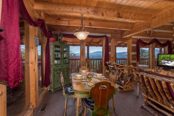 Dining room with seating for four at Mountain Glory, a 1 bedroom cabin rental located in Pigeon Forge