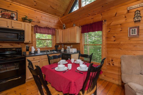 Dining table for four at Cabin Sweet Cabin, a 1 bedroom cabin rental located in Gatlinburg