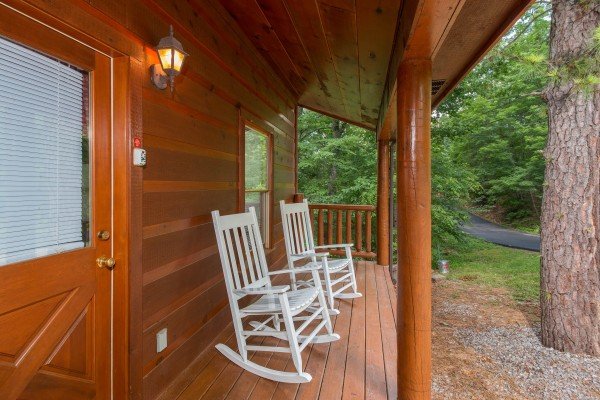 Rocking chairs on the porch at Cabin Sweet Cabin, a 1 bedroom cabin rental located in Gatlinburg