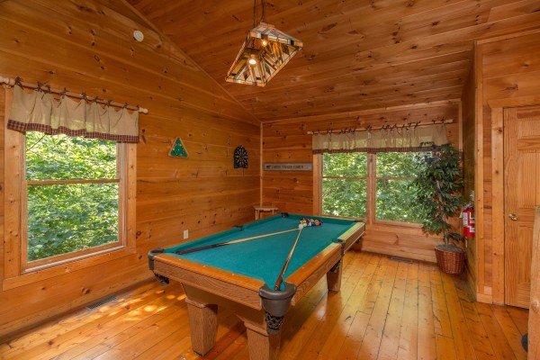 Pool table in the loft at Cabin Sweet Cabin, a 1 bedroom cabin rental located in Gatlinburg