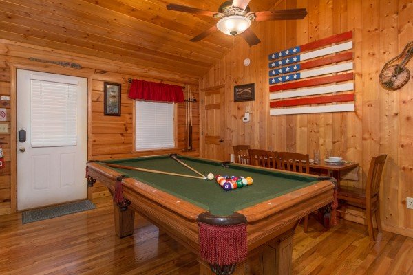 Pool table at A Beary Cozy Escape, a 1 bedroom cabin rental located in Pigeon Forge