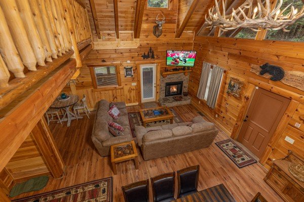 Aerial view of the living room at King Wolf Lodge, a 3 bedroom cabin rental located in Pigeon Forge