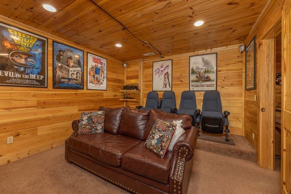 Theater room seating at King Wolf Lodge, a 3 bedroom cabin rental located in Pigeon Forge