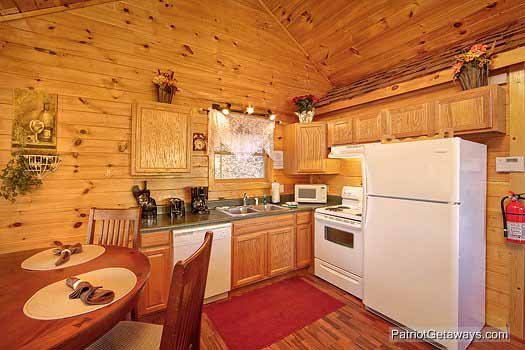 Kitchen area at Paradise Found, a 1 bedroom cabin rental located in Gatlinburg