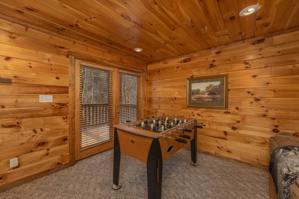 Foosball table at Smoky Bears Creek, a 2 bedroom cabin rental located in Pigeon Forge