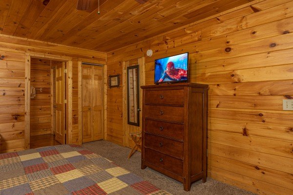 Dresser and TV in a bedroom at Bearway to Heaven, a 2 bedroom cabin rental located in Gatlinburg