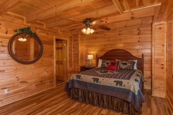 Bedroom with a king bed at Bear Bottom Retreat, a 4 bedroom cabin rental located in Pigeon Forge