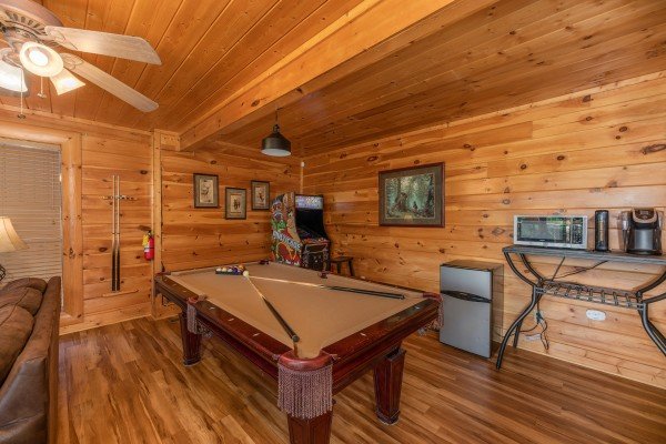 Pool table in the game room at Bear Bottom Retreat, a 4 bedroom cabin rental located in Pigeon Forge