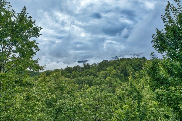 Mountain views with the famous smoke at Into the Mist, a 3 bedroom cabin rental located in Pigeon Forge
